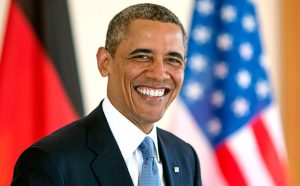 BERLIN, GERMANY - JUNE 19: U.S. President Barack Obama smiles as he signs the official guest book at Bellevue Palace on June 19, 2013 in Berlin, Germany. U.S. President Barack Obama is visiting Berlin for the first time during his presidency and his speech at the Brandenburg Gate is to be the highlight. Obama will be speaking close to the 50th anniversary of the historic speech by then U.S. President John F. Kennedy in Berlin in 1963. (Photo by Thomas Imo/Photothek via Getty Images)